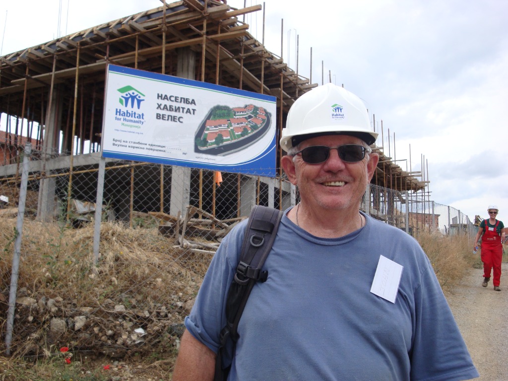 John Finnerty in front of a construction site sign in Veles